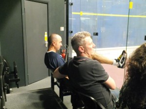 John White (L) relaxes with a beer, and Simon Parke (R) keeps a keen eye on the game being played